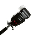 Camera with external flash unit set up for portrait photography