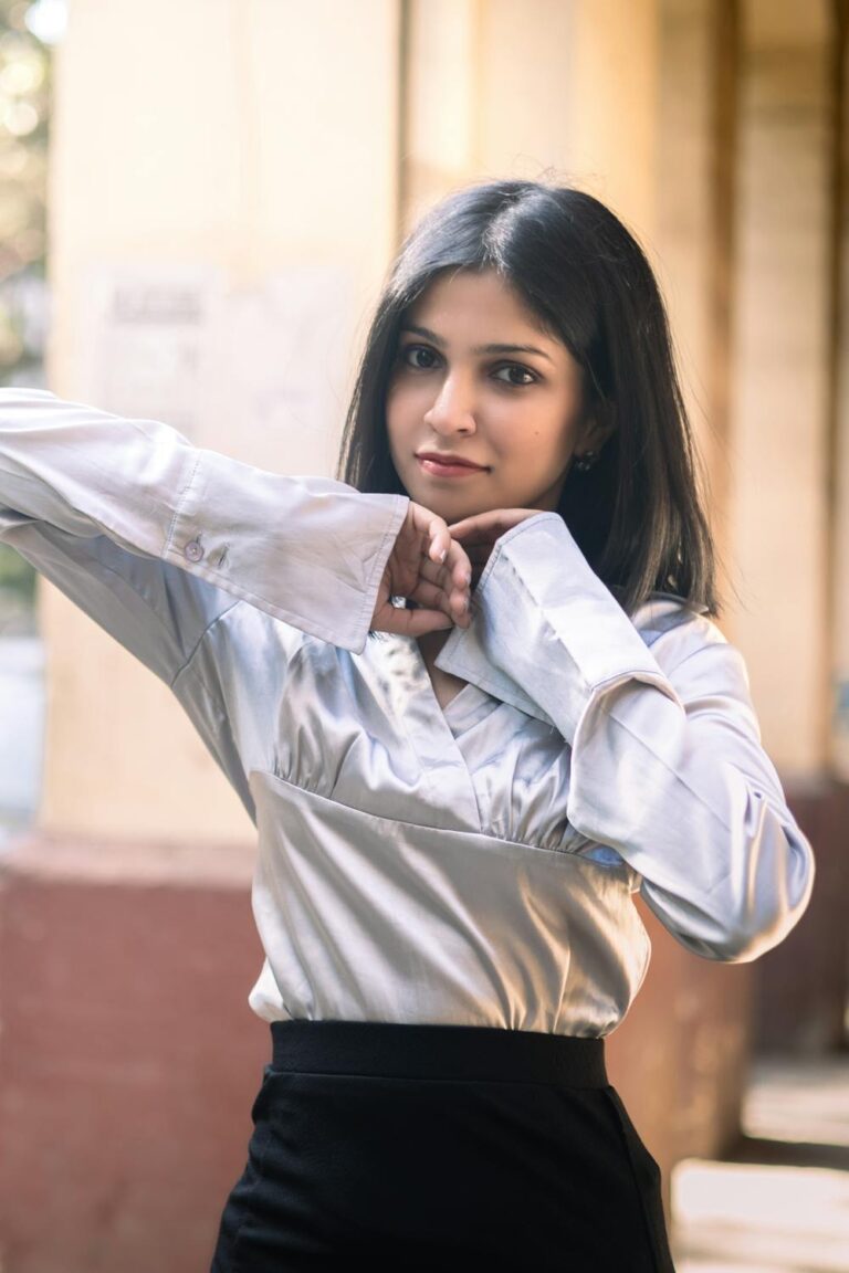 Woman posing outdoors with confidence in a natural candid setting