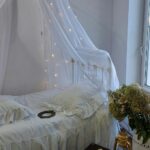 Cozy bedroom with layered textures and warm lighting