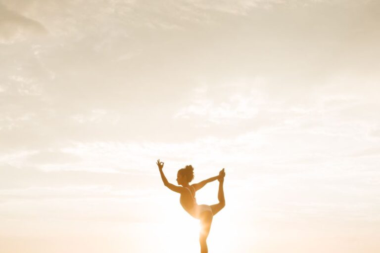 Woman posing for photos outdoors during golden hour light