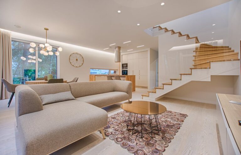 Cozy neutral living room with decorative pillows and warm tones